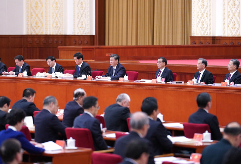 中国共产党第十九届中央委员会第五次全体会议,于2020年10月26日至29日在北京举行。这是习近平、李克强、栗战书、汪洋、王沪宁、赵乐际、韩正等在主席台上。新华社记者 殷博古 摄